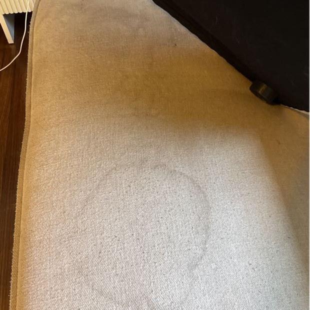 Ring stain on cream couch cushion before upholstery cleaning, Armadale