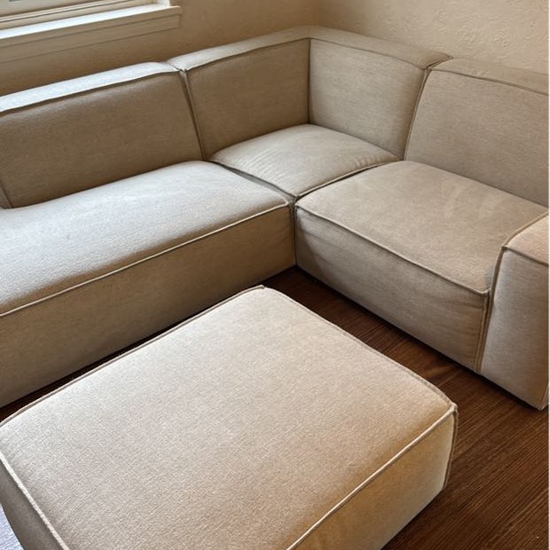 Modular couch and ottoman after steam cleaning, Armadale