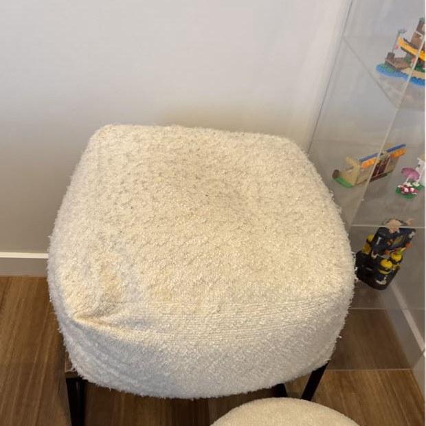 Bouclé armchair and pouf after upholstery cleaning