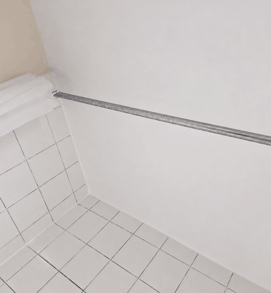 The same bathroom ceiling clean and mould-free after professional mould removal and treatment